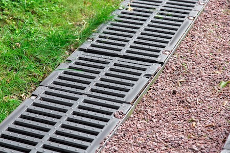 Common Drainage Problems in Columbus Yards and How Landscaping Can Help